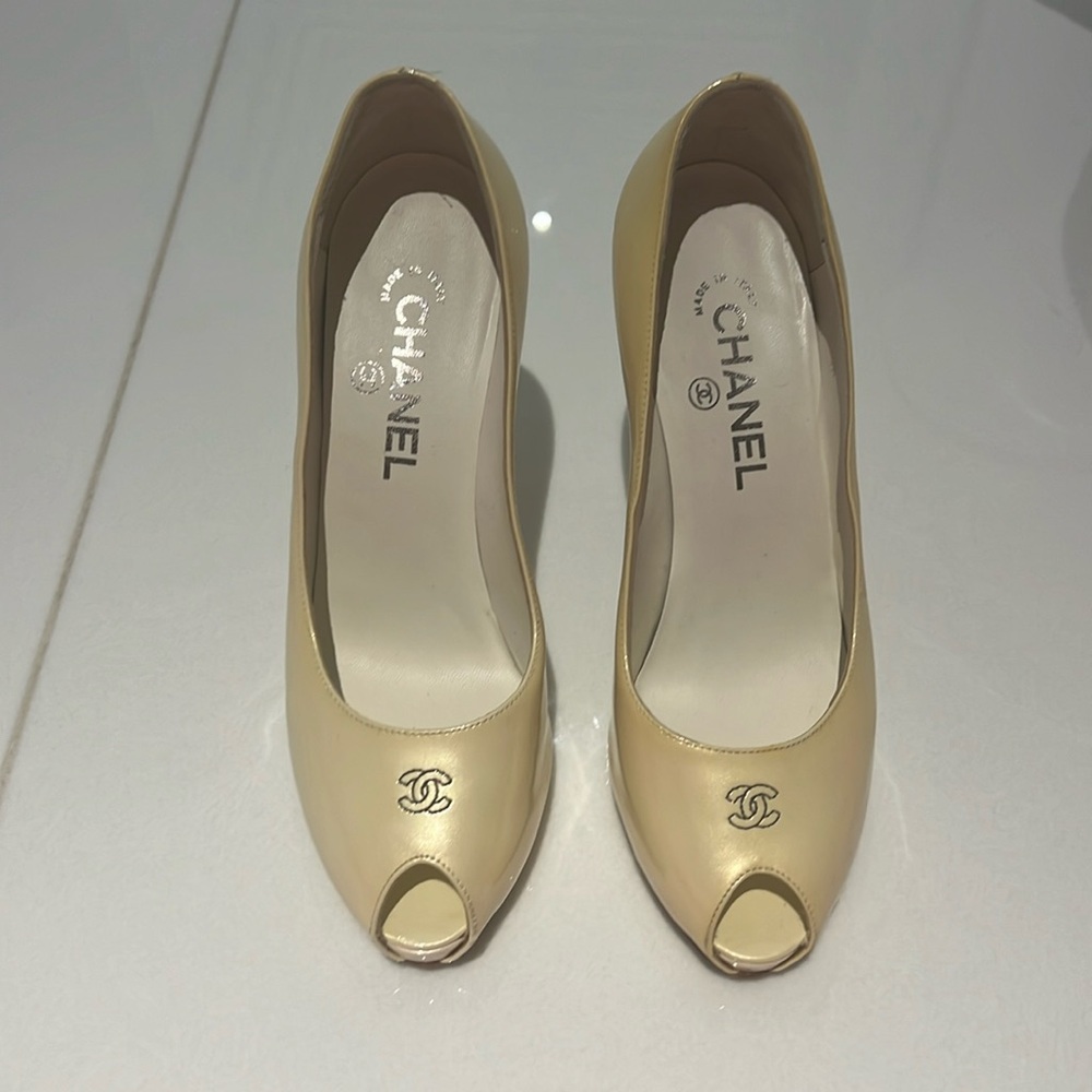 Chanel gold patent pumps